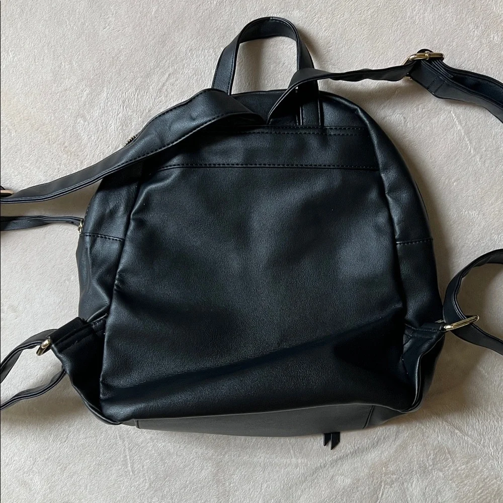 Charming Charlie Pin Accent Mini Backpack